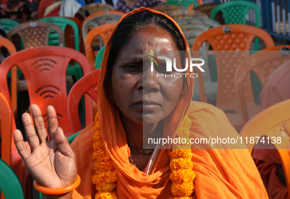 A member of Hindu Suraksha Samiti attends a protest meeting against the recent arrest of ISKCON Bangladesh priest Chinmoy Krishna Das by Dha...