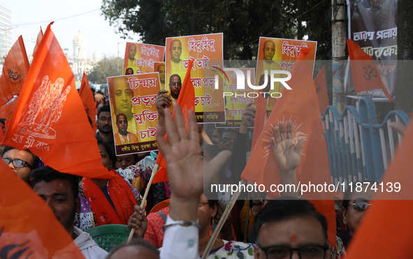 Members of Hindu Suraksha Samiti shout slogans during a protest against the recent arrest of ISKCON Bangladesh priest Chinmoy Krishna Das by...