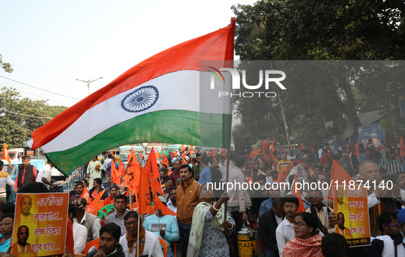 Members of Hindu Suraksha Samiti shout slogans during a protest against the recent arrest of ISKCON Bangladesh priest Chinmoy Krishna Das by...