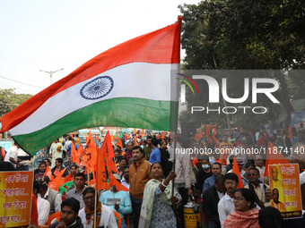 Members of Hindu Suraksha Samiti shout slogans during a protest against the recent arrest of ISKCON Bangladesh priest Chinmoy Krishna Das by...