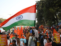 Members of Hindu Suraksha Samiti shout slogans during a protest against the recent arrest of ISKCON Bangladesh priest Chinmoy Krishna Das by...