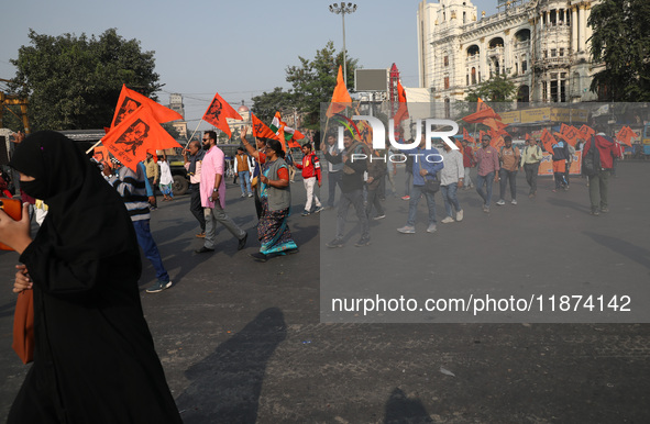 Members of Hindu Suraksha Samiti shout slogans during a protest against the recent arrest of ISKCON Bangladesh priest Chinmoy Krishna Das by...