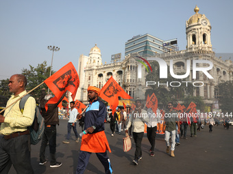 Members of Hindu Suraksha Samiti shout slogans during a protest against the recent arrest of ISKCON Bangladesh priest Chinmoy Krishna Das by...