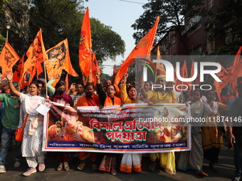 Members of Hindu Suraksha Samiti shout slogans during a protest against the recent arrest of ISKCON Bangladesh priest Chinmoy Krishna Das by...