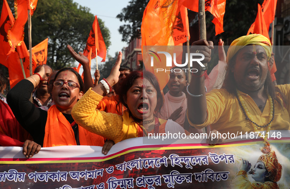 Members of Hindu Suraksha Samiti shout slogans during a protest against the recent arrest of ISKCON Bangladesh priest Chinmoy Krishna Das by...