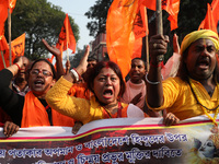 Members of Hindu Suraksha Samiti shout slogans during a protest against the recent arrest of ISKCON Bangladesh priest Chinmoy Krishna Das by...