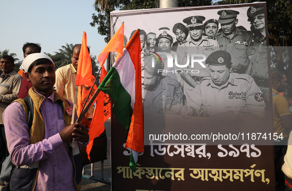 A member of Hindu Suraksha Samiti attends a protest meeting against the recent arrest of ISKCON Bangladesh priest Chinmoy Krishna Das by Dha...