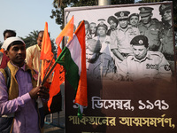 A member of Hindu Suraksha Samiti attends a protest meeting against the recent arrest of ISKCON Bangladesh priest Chinmoy Krishna Das by Dha...