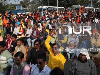 Members of Hindu Suraksha Samiti shout slogans during a protest against the recent arrest of ISKCON Bangladesh priest Chinmoy Krishna Das by...