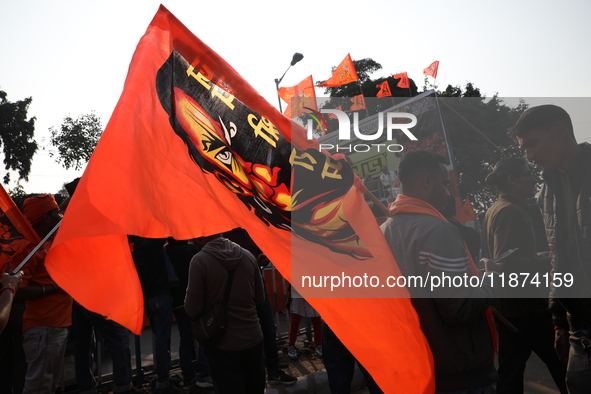 Members of Hindu Suraksha Samiti shout slogans during a protest against the recent arrest of ISKCON Bangladesh priest Chinmoy Krishna Das by...