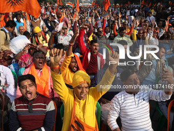 Members of Hindu Suraksha Samiti shout slogans during a protest against the recent arrest of ISKCON Bangladesh priest Chinmoy Krishna Das by...