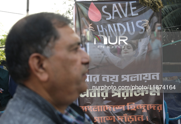 A member of Hindu Suraksha Samiti attends a protest meeting against the recent arrest of ISKCON Bangladesh priest Chinmoy Krishna Das by Dha...