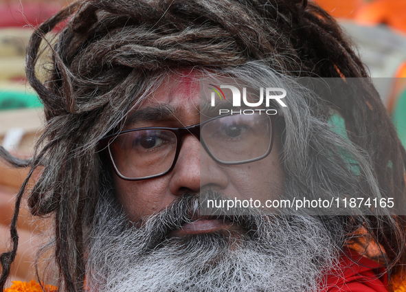 A member of Hindu Suraksha Samiti attends a protest meeting against the recent arrest of ISKCON Bangladesh priest Chinmoy Krishna Das by Dha...