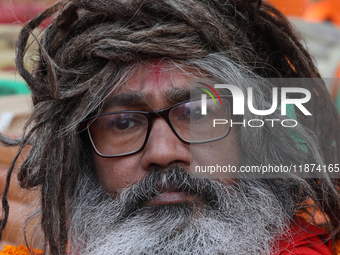 A member of Hindu Suraksha Samiti attends a protest meeting against the recent arrest of ISKCON Bangladesh priest Chinmoy Krishna Das by Dha...