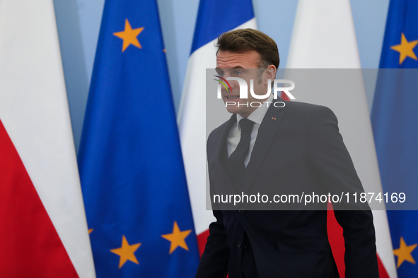 In Warsaw, Poland, on December 12, 2024, French President Emmanuel Macron meets with Polish Prime Minister Donald Tusk at the Chancellery of...