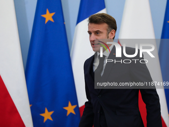 In Warsaw, Poland, on December 12, 2024, French President Emmanuel Macron meets with Polish Prime Minister Donald Tusk at the Chancellery of...