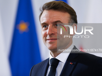 In Warsaw, Poland, on December 12, 2024, French President Emmanuel Macron meets with Polish Prime Minister Donald Tusk at the Chancellery of...