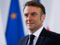 In Warsaw, Poland, on December 12, 2024, French President Emmanuel Macron meets with Polish Prime Minister Donald Tusk at the Chancellery of...