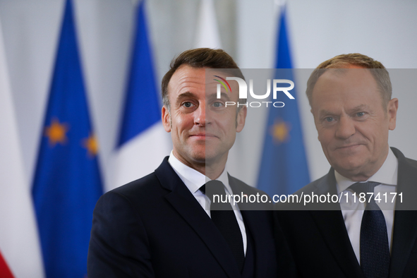 In Warsaw, Poland, on December 12, 2024, French President Emmanuel Macron meets with Polish Prime Minister Donald Tusk at the Chancellery of...