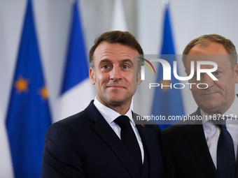 In Warsaw, Poland, on December 12, 2024, French President Emmanuel Macron meets with Polish Prime Minister Donald Tusk at the Chancellery of...