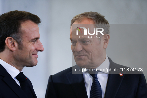 In Warsaw, Poland, on December 12, 2024, French President Emmanuel Macron meets with Polish Prime Minister Donald Tusk at the Chancellery of...