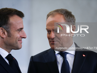 In Warsaw, Poland, on December 12, 2024, French President Emmanuel Macron meets with Polish Prime Minister Donald Tusk at the Chancellery of...