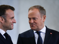 In Warsaw, Poland, on December 12, 2024, French President Emmanuel Macron meets with Polish Prime Minister Donald Tusk at the Chancellery of...