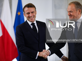 In Warsaw, Poland, on December 12, 2024, French President Emmanuel Macron meets with Polish Prime Minister Donald Tusk at the Chancellery of...