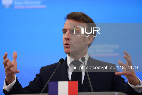 In Warsaw, Poland, on December 12, 2024, French President Emmanuel Macron meets with Polish Prime Minister Donald Tusk at the Chancellery of...