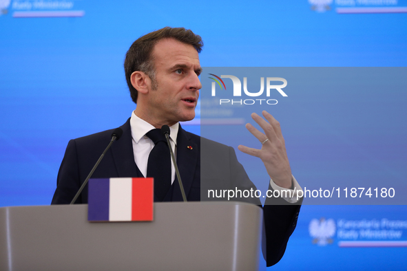 In Warsaw, Poland, on December 12, 2024, French President Emmanuel Macron meets with Polish Prime Minister Donald Tusk at the Chancellery of...