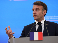 In Warsaw, Poland, on December 12, 2024, French President Emmanuel Macron meets with Polish Prime Minister Donald Tusk at the Chancellery of...