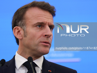 In Warsaw, Poland, on December 12, 2024, French President Emmanuel Macron meets with Polish Prime Minister Donald Tusk at the Chancellery of...