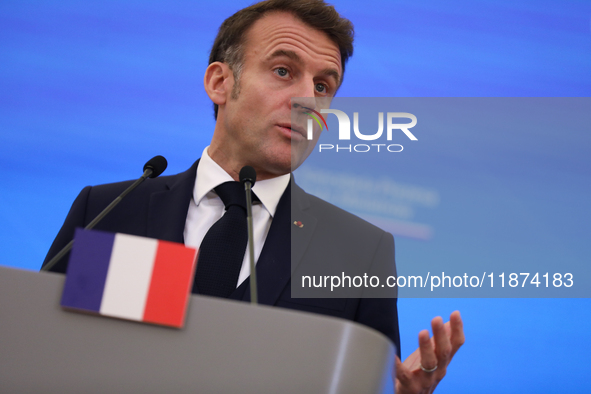 In Warsaw, Poland, on December 12, 2024, French President Emmanuel Macron meets with Polish Prime Minister Donald Tusk at the Chancellery of...