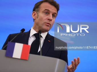 In Warsaw, Poland, on December 12, 2024, French President Emmanuel Macron meets with Polish Prime Minister Donald Tusk at the Chancellery of...