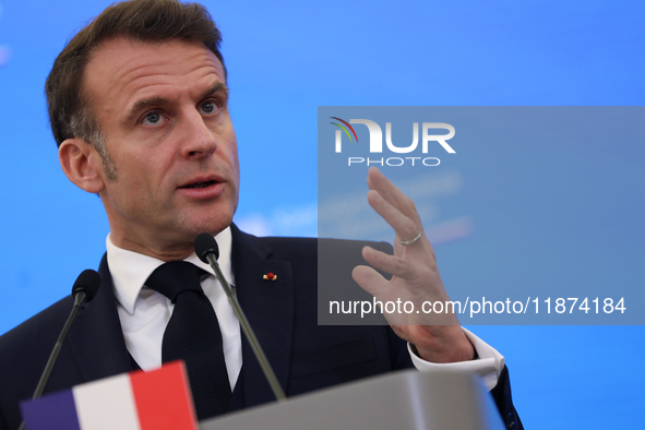 In Warsaw, Poland, on December 12, 2024, French President Emmanuel Macron meets with Polish Prime Minister Donald Tusk at the Chancellery of...