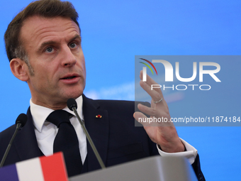 In Warsaw, Poland, on December 12, 2024, French President Emmanuel Macron meets with Polish Prime Minister Donald Tusk at the Chancellery of...