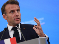 In Warsaw, Poland, on December 12, 2024, French President Emmanuel Macron meets with Polish Prime Minister Donald Tusk at the Chancellery of...