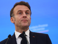 In Warsaw, Poland, on December 12, 2024, French President Emmanuel Macron meets with Polish Prime Minister Donald Tusk at the Chancellery of...