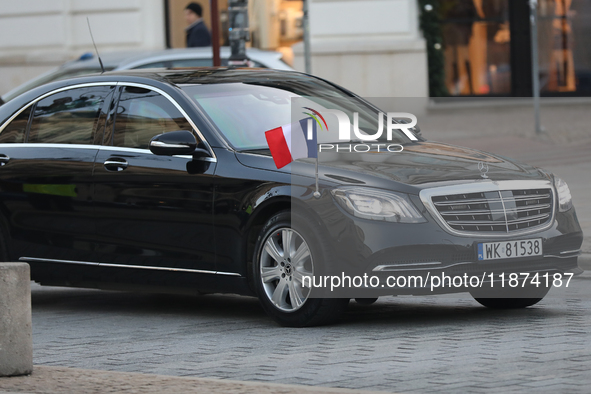 In Warsaw, Poland, on December 12, 2024, a car with French President Emmanuel Macron is present during a meeting with Polish President Andrz...