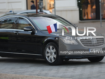 In Warsaw, Poland, on December 12, 2024, a car with French President Emmanuel Macron is present during a meeting with Polish President Andrz...