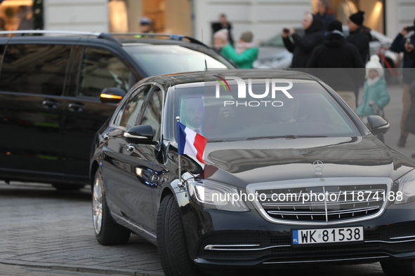 In Warsaw, Poland, on December 12, 2024, a car with French President Emmanuel Macron is present during a meeting with Polish President Andrz...