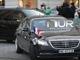 In Warsaw, Poland, on December 12, 2024, a car with French President Emmanuel Macron is present during a meeting with Polish President Andrz...