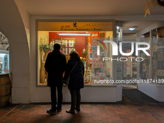 A shop window is festively decorated in Wasserburg am Inn, Bavaria, Germany, on December 15, 2024. (