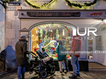 A shop window is festively decorated in Wasserburg am Inn, Bavaria, Germany, on December 15, 2024. (