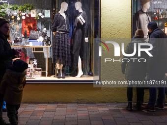 A shop window is festively decorated in Wasserburg am Inn, Bavaria, Germany, on December 15, 2024. (