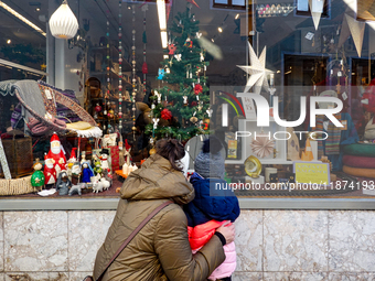 A shop window is festively decorated in Wasserburg am Inn, Bavaria, Germany, on December 15, 2024. (