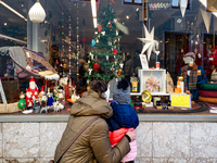 A shop window is festively decorated in Wasserburg am Inn, Bavaria, Germany, on December 15, 2024. (