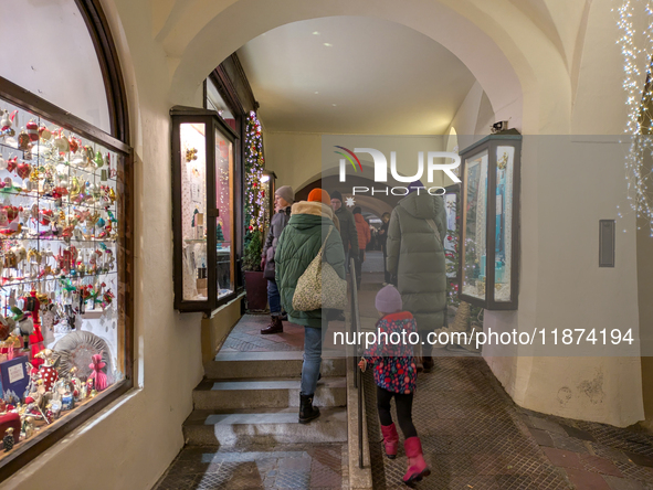 A shop window is festively decorated in Wasserburg am Inn, Bavaria, Germany, on December 15, 2024. 