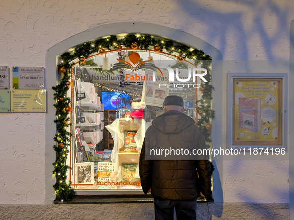 A shop window is festively decorated in Wasserburg am Inn, Bavaria, Germany, on December 15, 2024. 