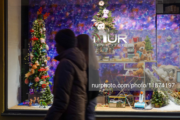 A shop window is festively decorated in Wasserburg am Inn, Bavaria, Germany, on December 15, 2024. 